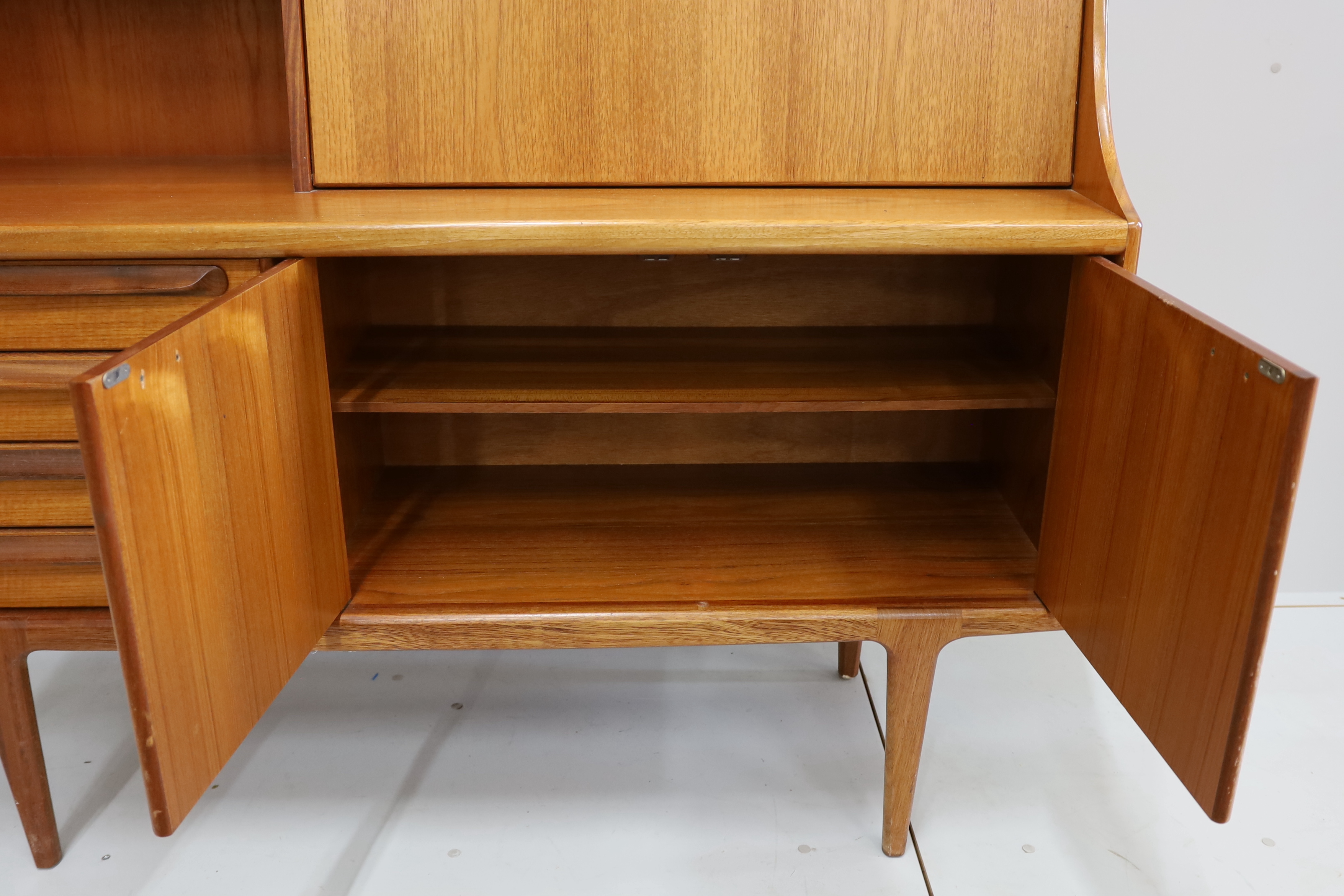 John Herbert for Younger Furniture - A teak high sideboard, width 145cm, depth 46cm, height 130cm